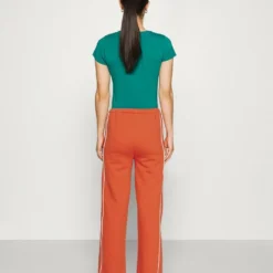 Ellesse AMITI PANT - Pantalon De Survêtement - Dark Orange -Ellesse Elegant Boutique 0f1b769fb155499c9b5e11be82f23b36