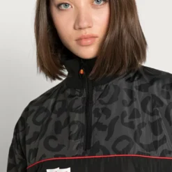 Ellesse ANGLE TRACK TOP - Veste Coupe-vent - Black -Ellesse Elegant Boutique 20f5a4be6e9649cd8929fd104d7bff59