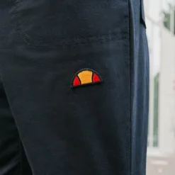 Ellesse DUCCIO PANT - Pantalon Cargo - Black -Ellesse Elegant Boutique 24b3edfbe413469f905c544116e15be7