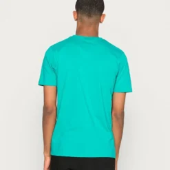 Ellesse MAVOZ UNISEX - T-shirt Imprimé - Teal -Ellesse Elegant Boutique 2df27f68d4ab459d936b4c4de22eba64