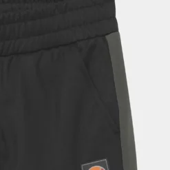 Ellesse TEMI TRACK UNISEX - Pantalon De Survêtement - Black/dark Green -Ellesse Elegant Boutique 54872a3a40234e65ac2d7a41cfb421a8