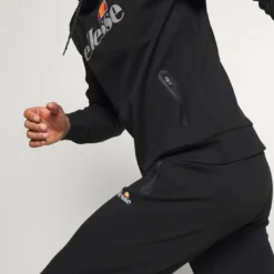 Ellesse OSTERIA - Pantalon De Survêtement - Black -Ellesse Elegant Boutique 7a7989a5833e4e6f86a4a11b74f4cf6d