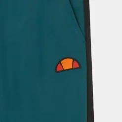 Ellesse PIOVEGA UNISEX - Pantalon De Survêtement - Teal/black -Ellesse Elegant Boutique 7c9926fbbba04aecb4d0eee59435e38c