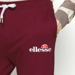 Ellesse NIORO TRACK PANT - Pantalon De Survêtement - Burgundy 9 Ellesse NIORO TRACK PANT - Pantalon De Survêtement - Burgundy -Ellesse Elegant Boutique 8e3a670641314e1082e220dee5f77f48