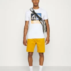 Ellesse SALUS TEE - T-shirt Imprimé - White -Ellesse Elegant Boutique c013a8698abf4a60b6cdfc93ca641a9c