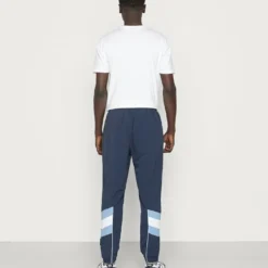 Ellesse MINUTI TRACK TOP - Pantalon De Survêtement - Navy -Ellesse Elegant Boutique c73e75632e5c4d358fb12f4fd5aa30cd