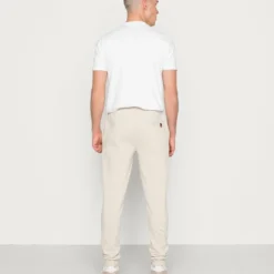 Ellesse GRANITE PANT - Pantalon De Survêtement - Beige 7 Ellesse GRANITE PANT - Pantalon De Survêtement - Beige -Ellesse Elegant Boutique ce1a69583d224fa694e723786f56b56b