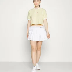 Ellesse DERLA CROP - T-shirt Basique - Light Yellow 14 Ellesse DERLA CROP - T-shirt Basique - Light Yellow -Ellesse Elegant Boutique d069adb6ab604810b949f07cf78abbf6