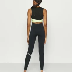 Ellesse TUTTAN CROP - Débardeur - Black -Ellesse Elegant Boutique d0b72820cb844feeb56c8b3dd92162a0