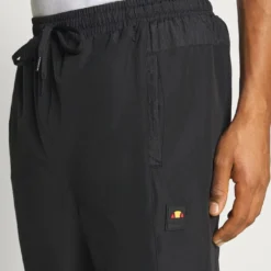 Ellesse STOREO - Pantalon De Survêtement - Black 9 Ellesse STOREO - Pantalon De Survêtement - Black -Ellesse Elegant Boutique d29188cd94b746c3857eb068477ffd1e