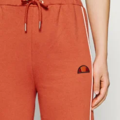 Ellesse AMITI PANT - Pantalon De Survêtement - Dark Orange -Ellesse Elegant Boutique d84f744dc05142218d066ebebc57d788