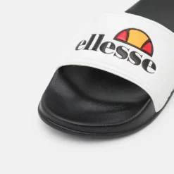 Ellesse FILIPPO - Mules - White/black -Ellesse Elegant Boutique df0802ac8f844fa88897443c990b1da3