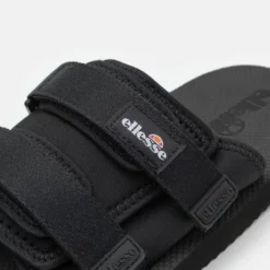 Ellesse NORO SLIDE - Mules - Black 11 Ellesse NORO SLIDE - Mules - Black -Ellesse Elegant Boutique f1b3dc70848a42c78bb8469c04e6bba7