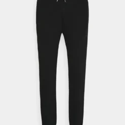 Ellesse GARNA - Pantalon De Survêtement - Black -Ellesse Elegant Boutique f30f07e925b245fca3b51b76e4d57dc7